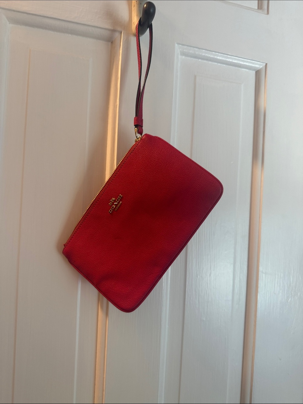 Coach Pink Pebbled Leather Wristlet with Gold Hardware